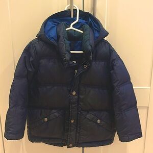 Size 4 navy blue Lands end down puffer coat. Zipper and snap closure.